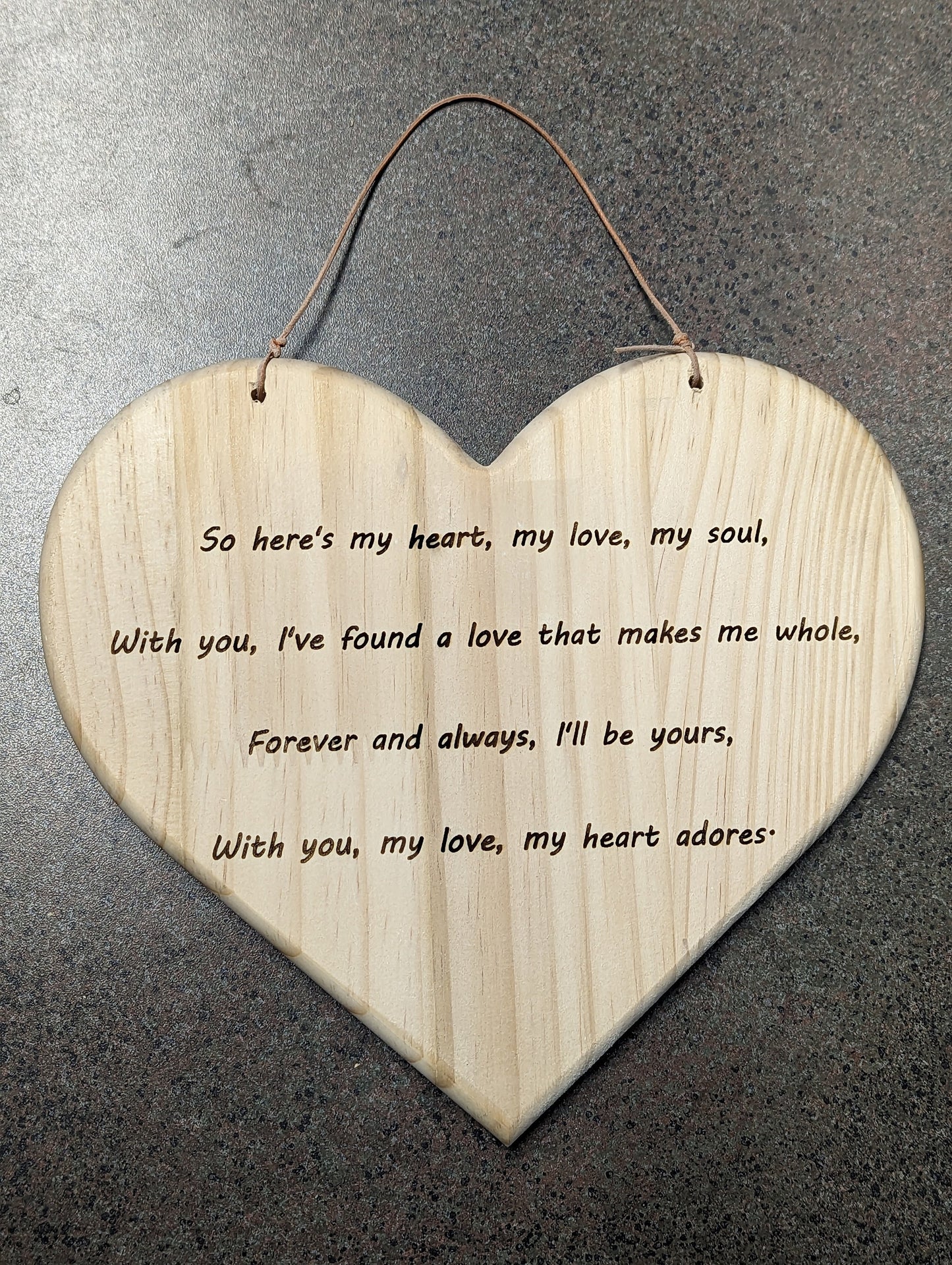 9-inch-wide solid wood heart with romantic poem