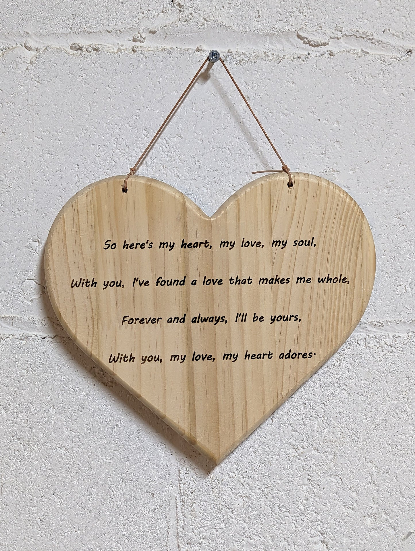 9-inch-wide solid wood heart with romantic poem