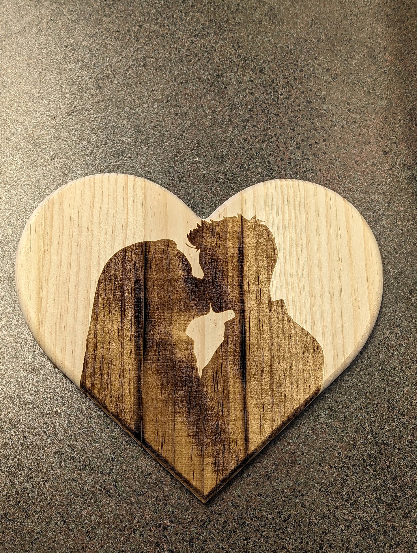 9-inch-wide solid wood heart with romantic couple kissing silhouette
